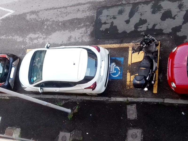 disabili parcheggio scooter