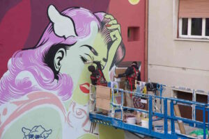 Livorno Inaugurata nel quartiere Ovosodo l’opera muraria “Brucia via la tua ombra” dell’artista DFace